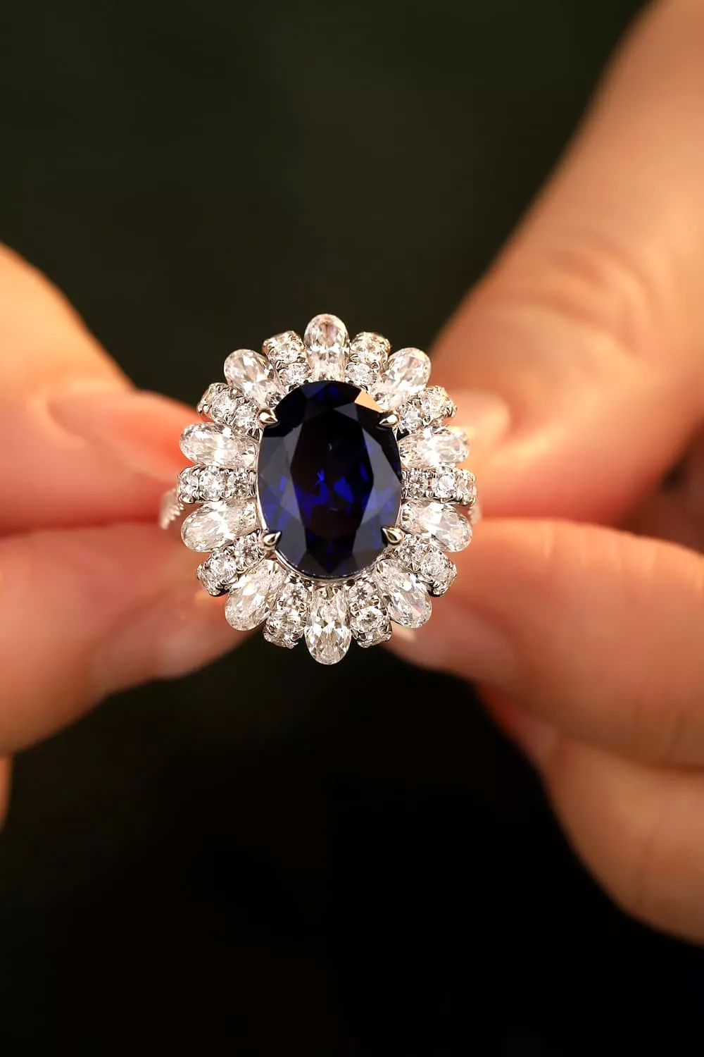 Oval Sapphire in Flower Shape CZ Ring