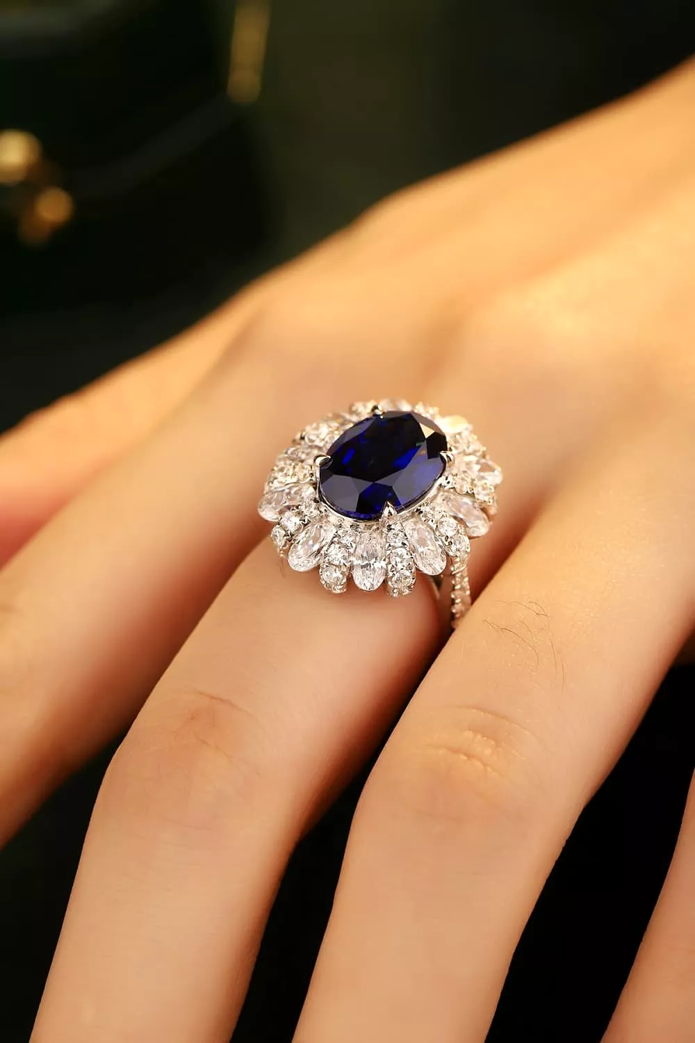 Oval Sapphire in Flower Shape CZ Ring